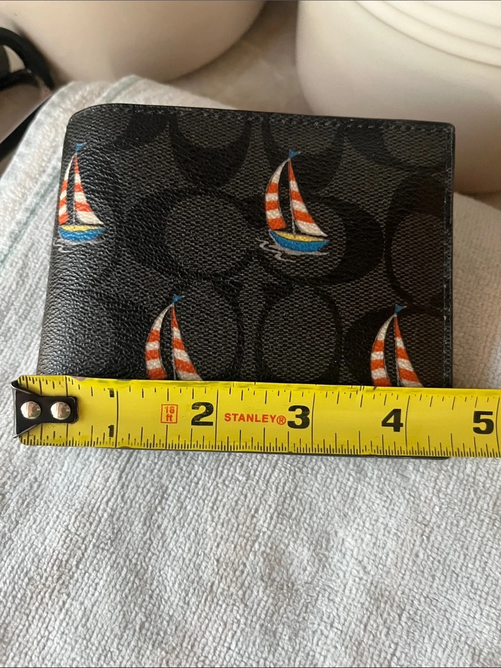 Coach Black Signature Canvas Men’s Bifold Wallet with Colorful Sailboat Motif
